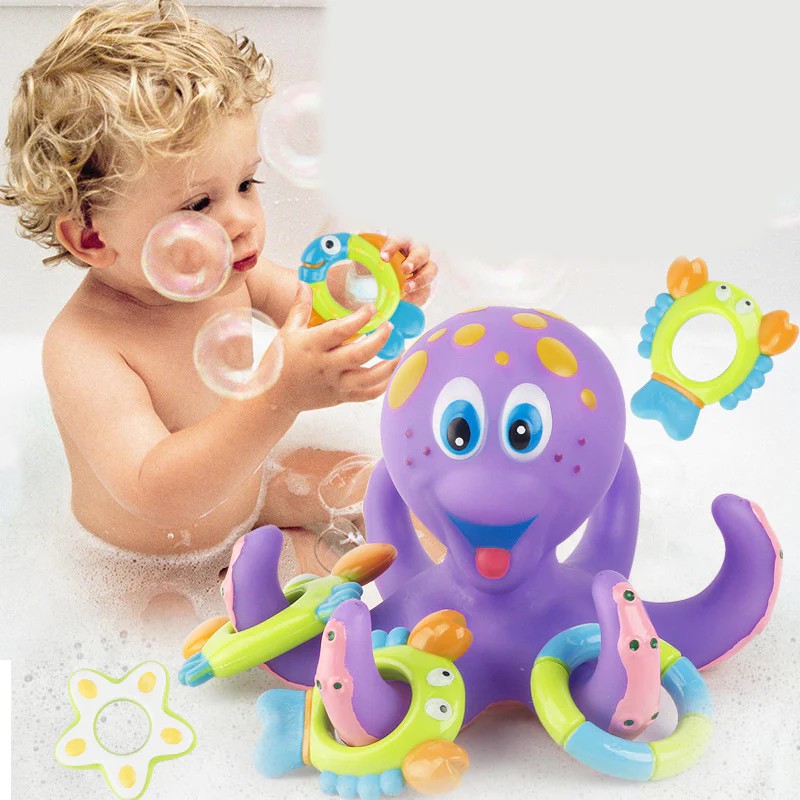 Bath time with baby and octopus bath toy